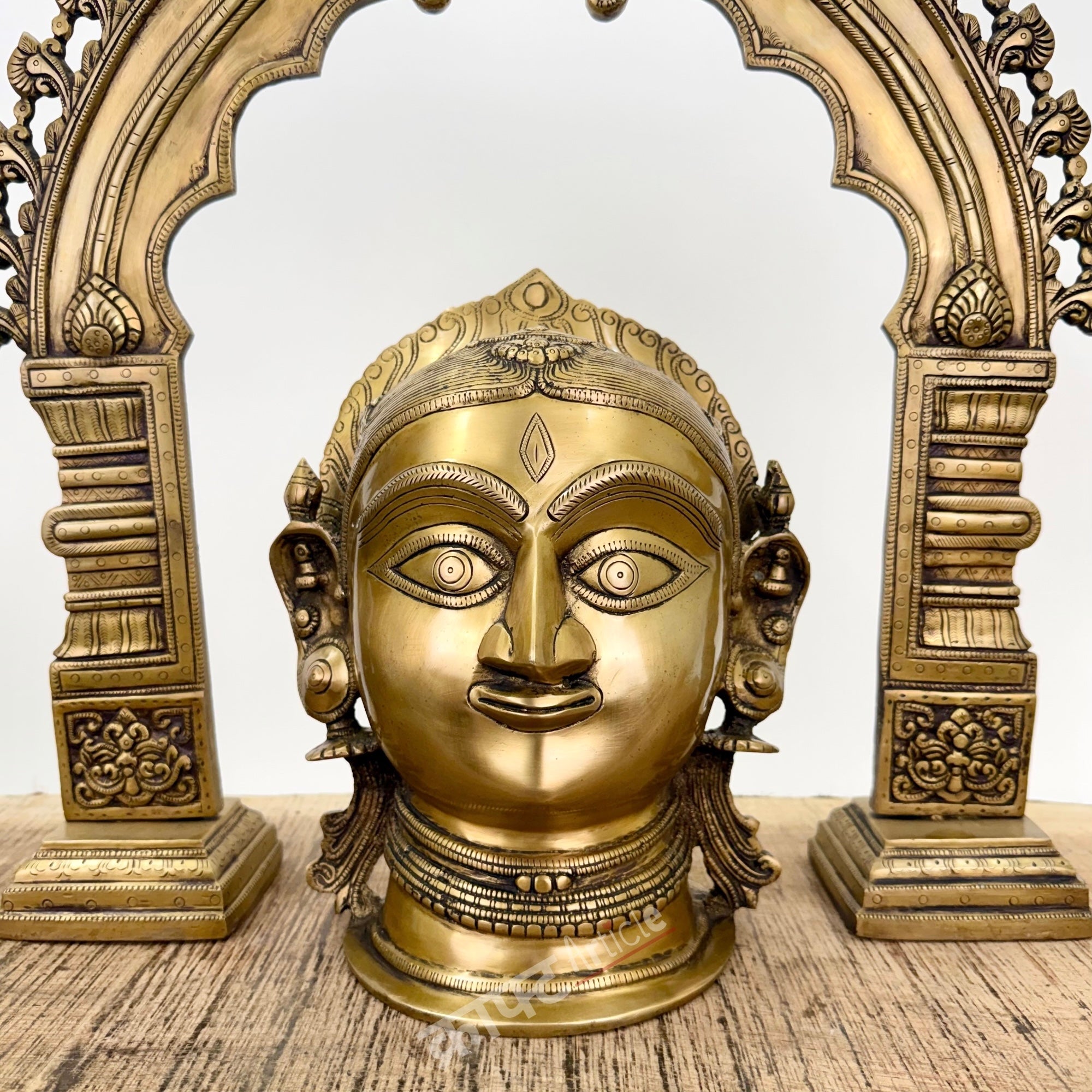 Brass Gauri Head Displayed with a Traditional Prabhavali (as a pair)
