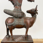 Brass Lord Krishna Seated on Cow
