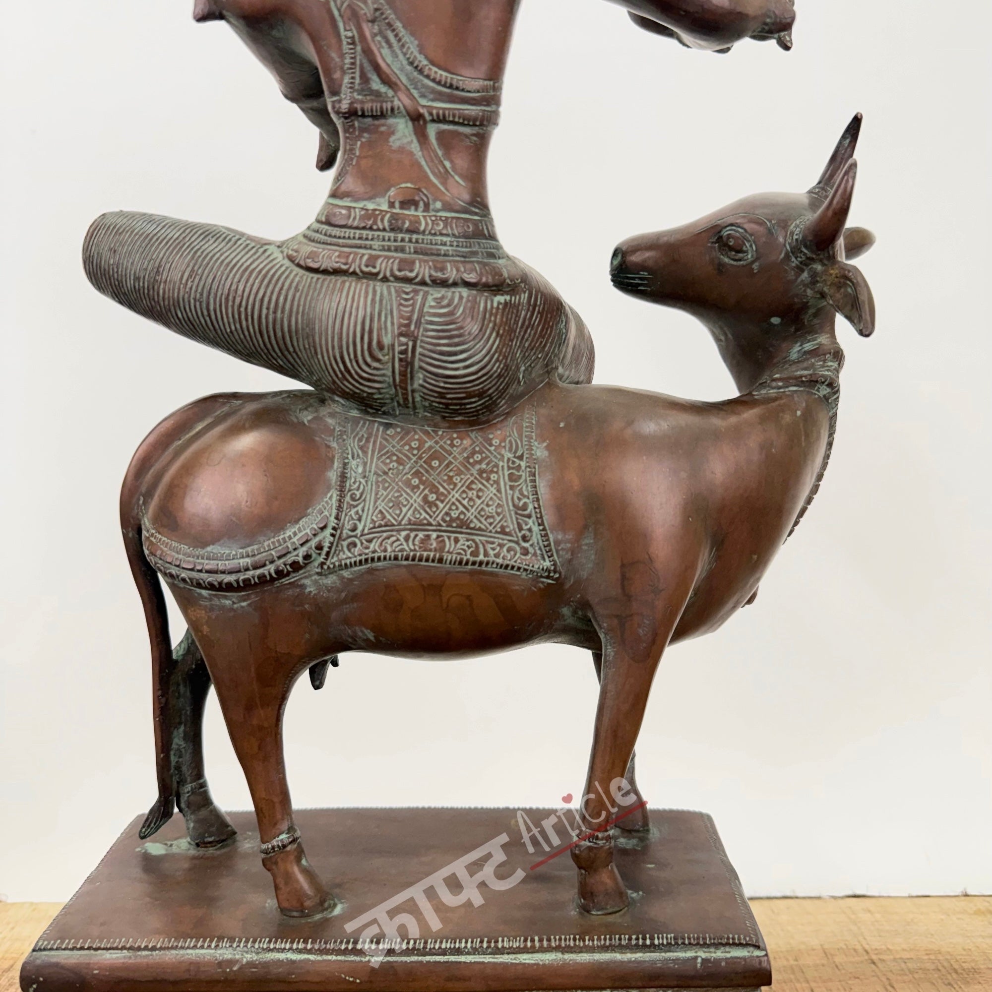 Brass Lord Krishna Seated on Cow