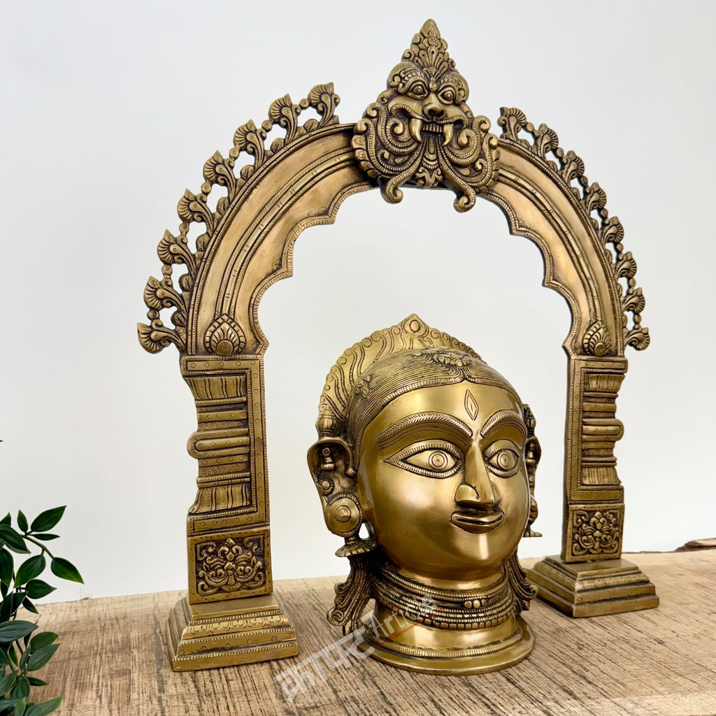 Brass Gauri Head Displayed with a Traditional Prabhavali (as a pair)