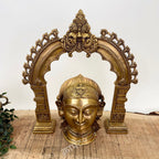 Brass Gauri Head Displayed with a Traditional Prabhavali (as a pair)