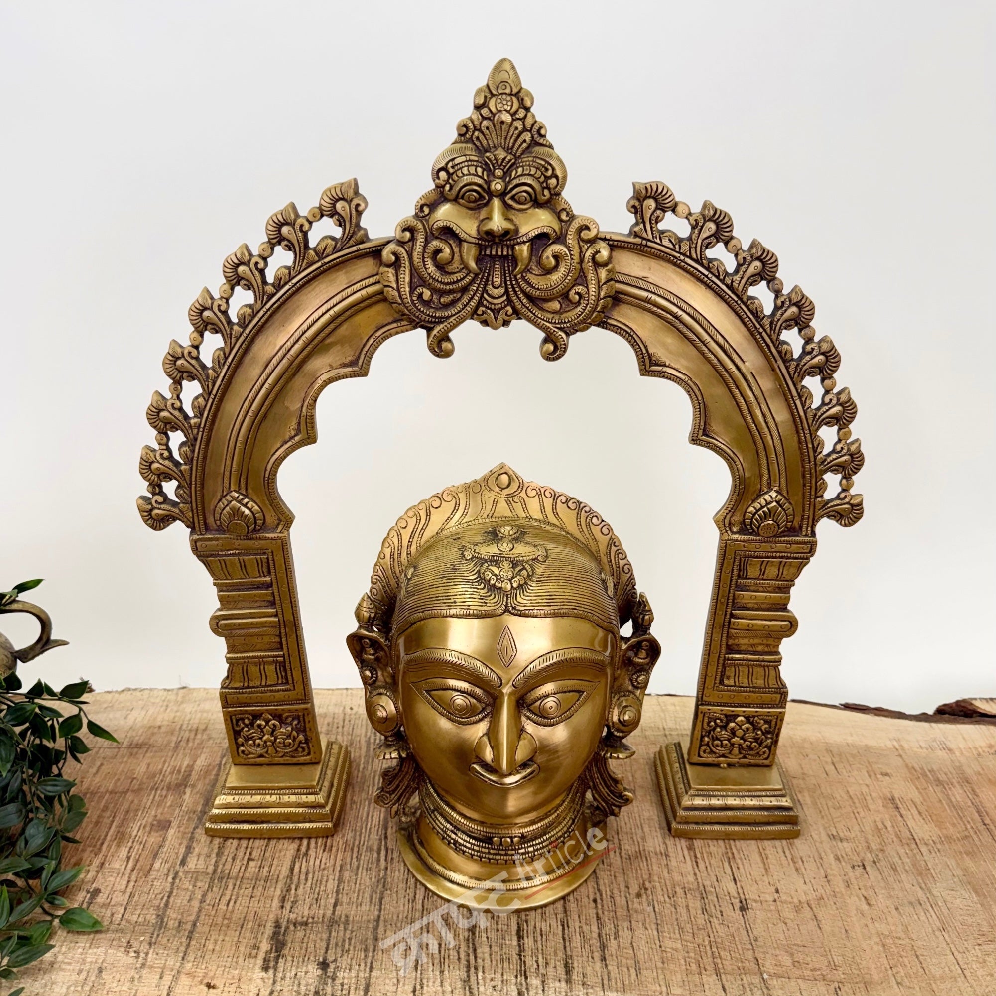 Brass Gauri Head Displayed with a Traditional Prabhavali (as a pair)