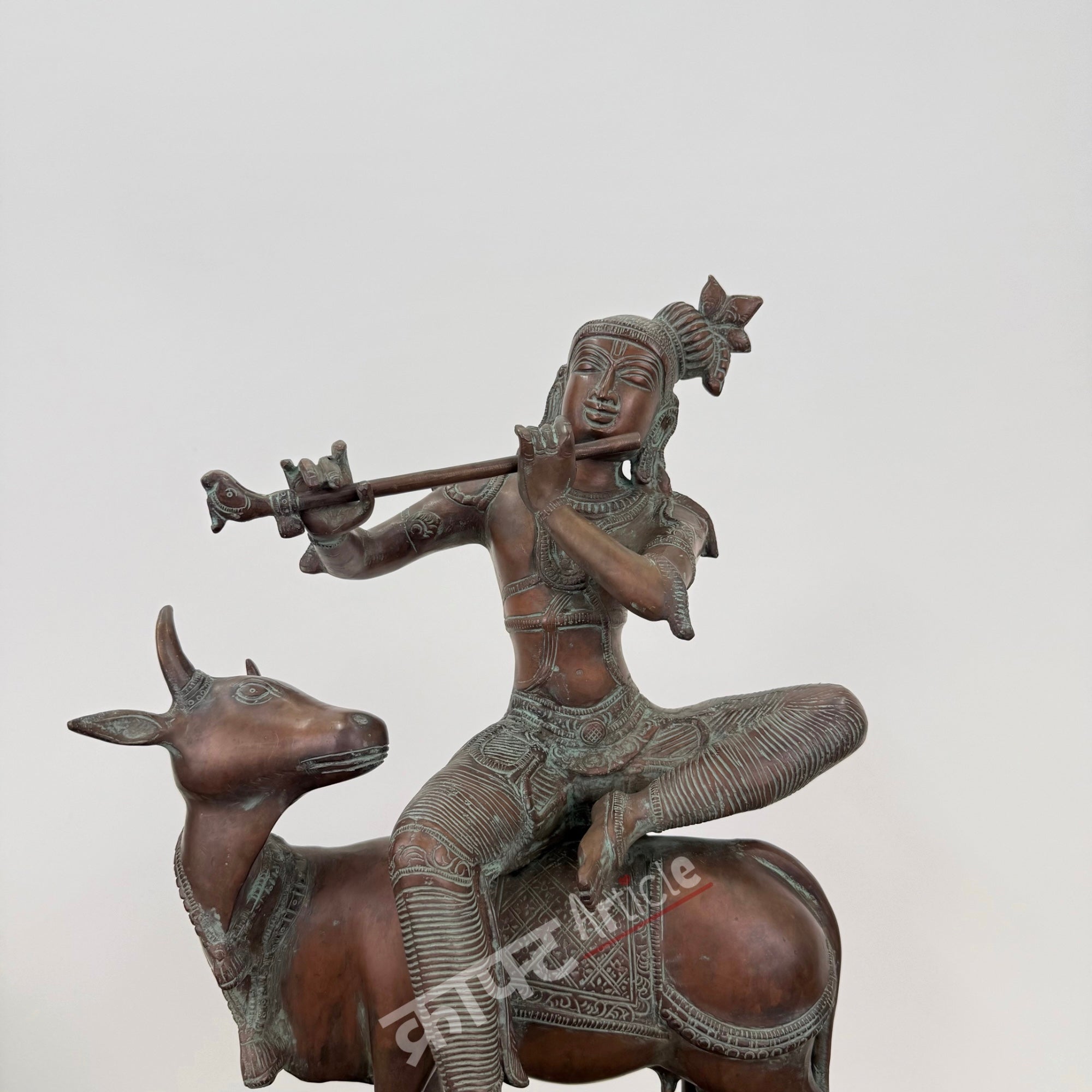 Brass Lord Krishna Seated on Cow