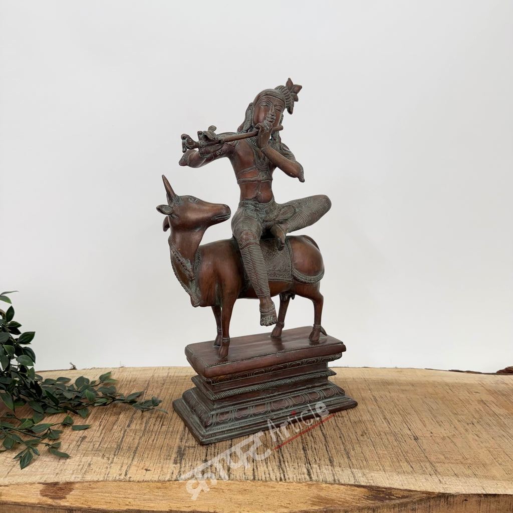Brass Lord Krishna Seated on Cow