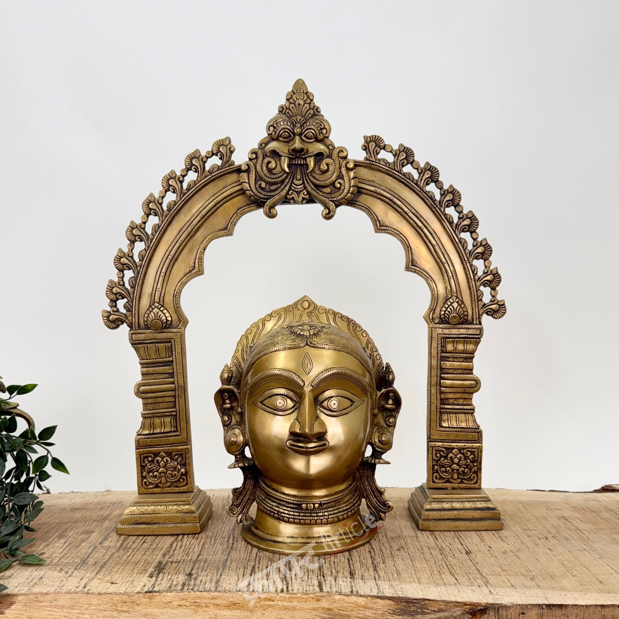 Brass Gauri Head Displayed with a Traditional Prabhavali (as a pair)