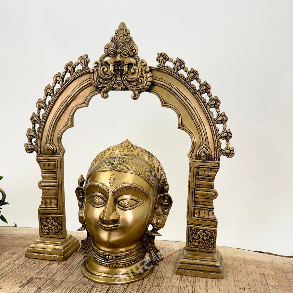 Brass Gauri Head Displayed with a Traditional Prabhavali (as a pair)