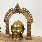 Brass Gauri Head Displayed with a Traditional Prabhavali (as a pair)