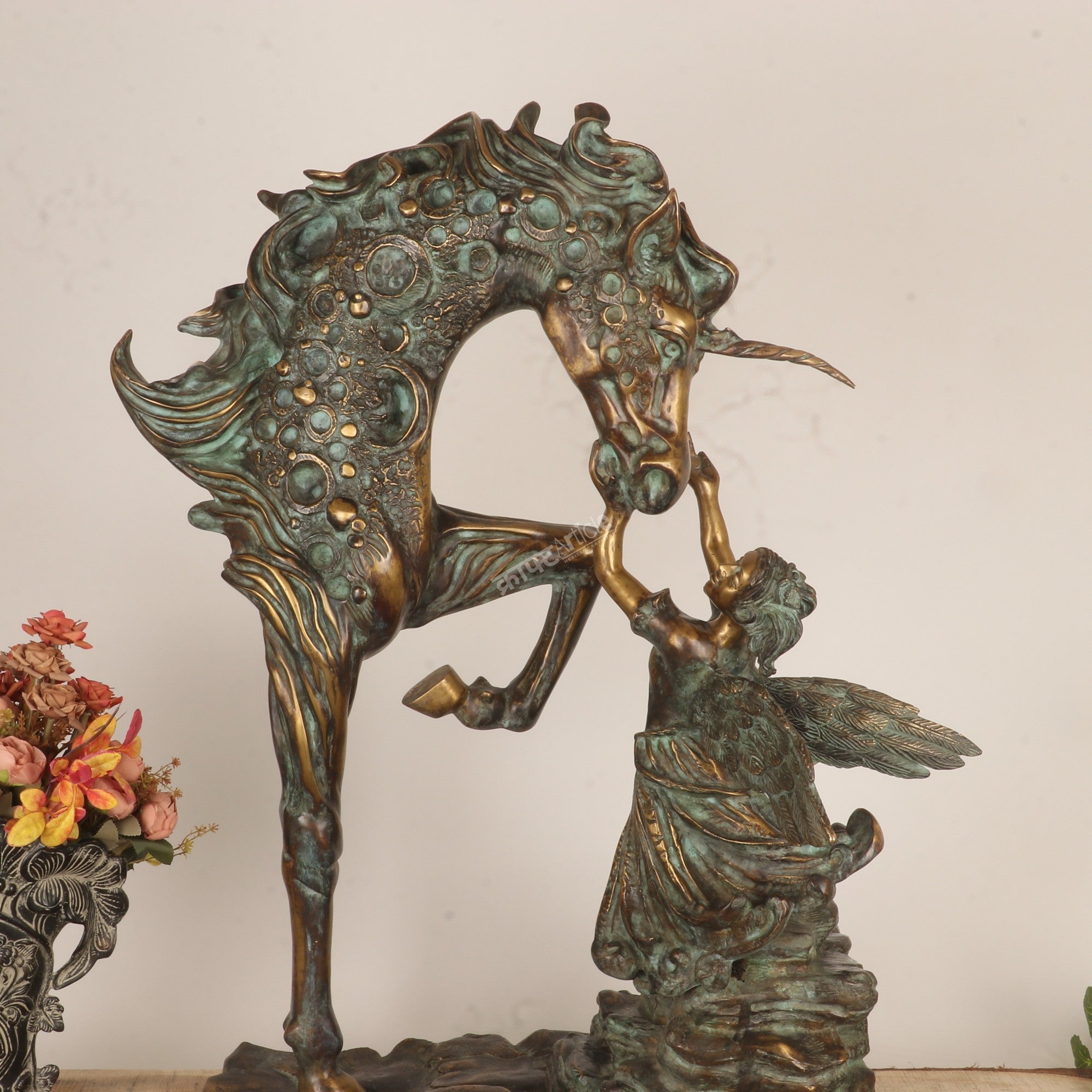 Exploring the Symbolism Behind This Angel & Horse Sculpture