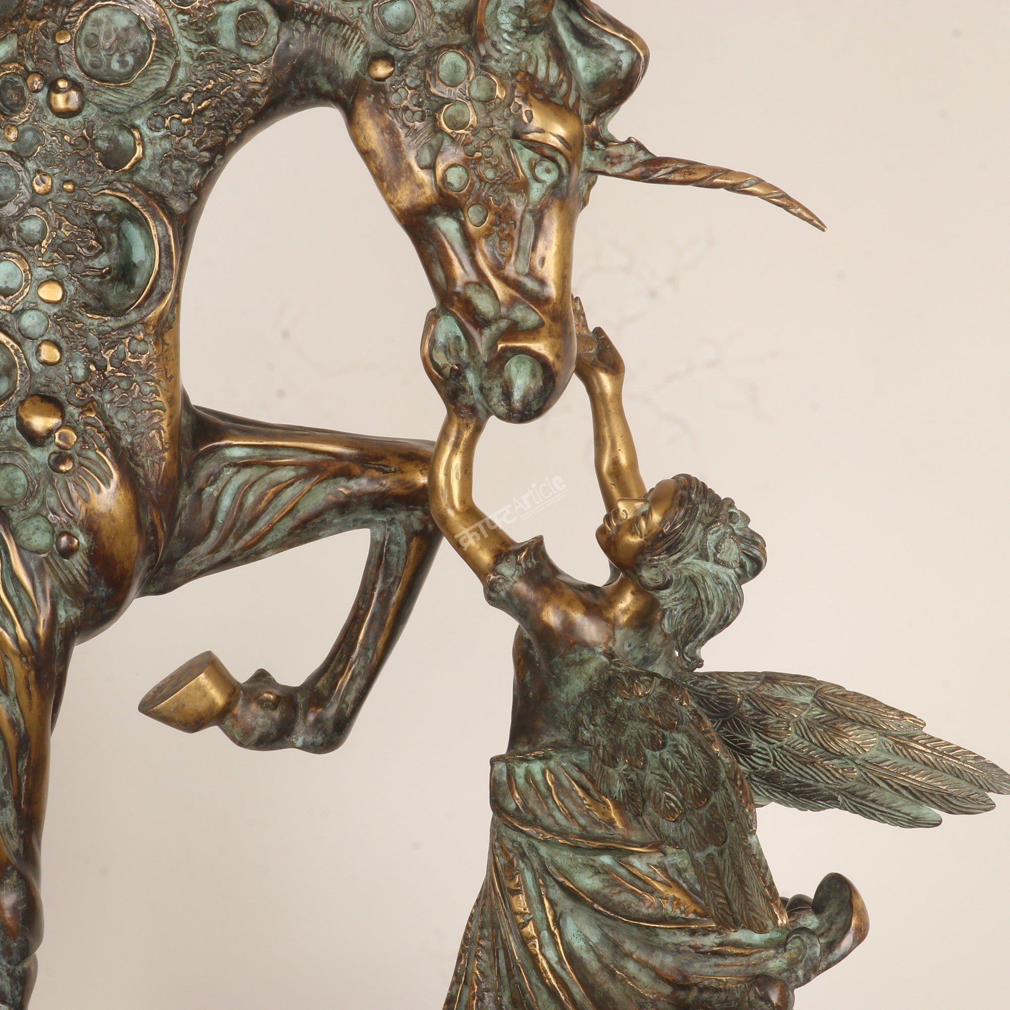 Exploring the Symbolism Behind This Angel & Horse Sculpture