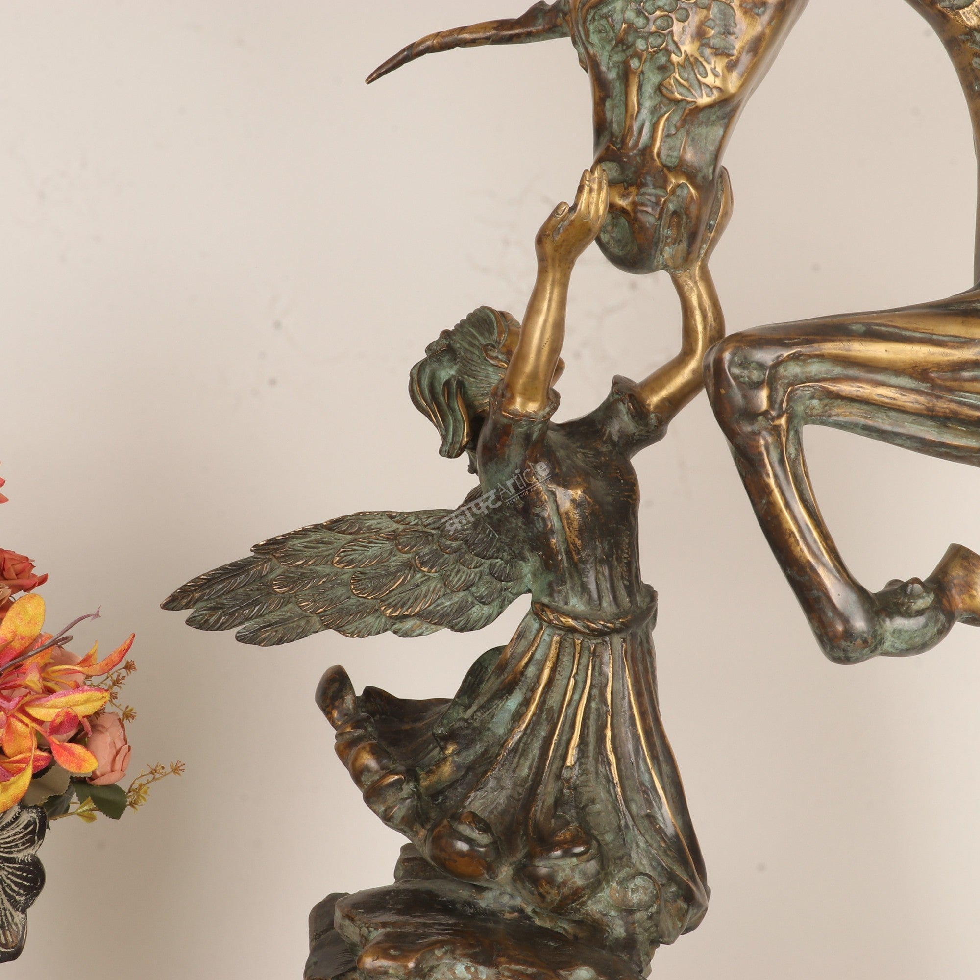 Exploring the Symbolism Behind This Angel & Horse Sculpture