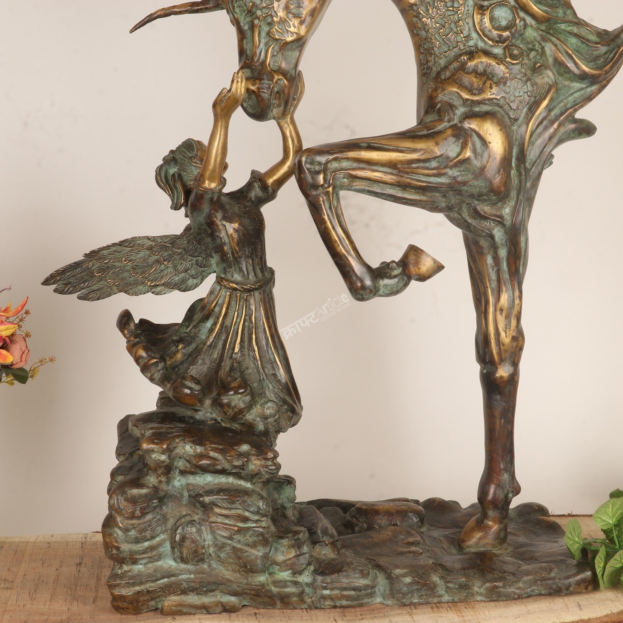 Exploring the Symbolism Behind This Angel & Horse Sculpture