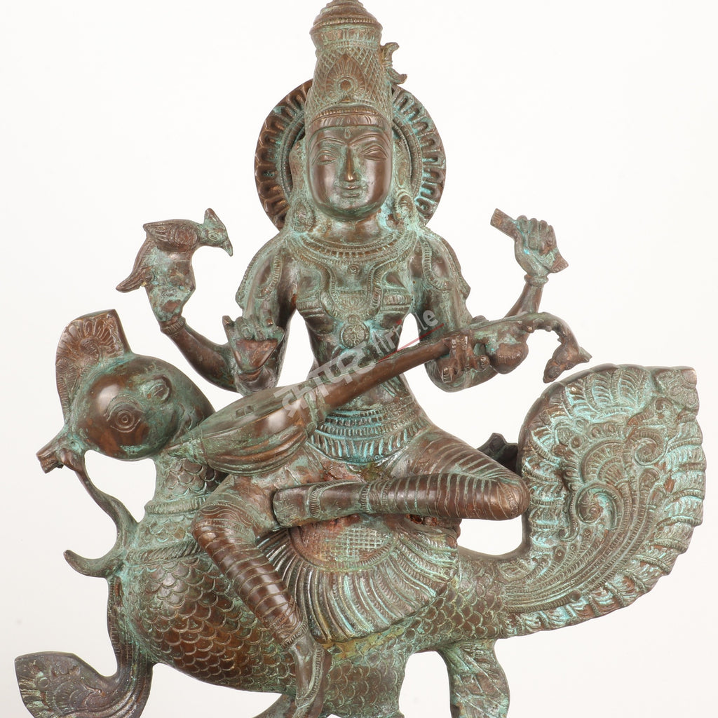 Brass Goddess Sarasvati Sculpture – Seated on Peacock