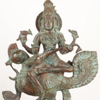 Brass Goddess Sarasvati Sculpture – Seated on Peacock