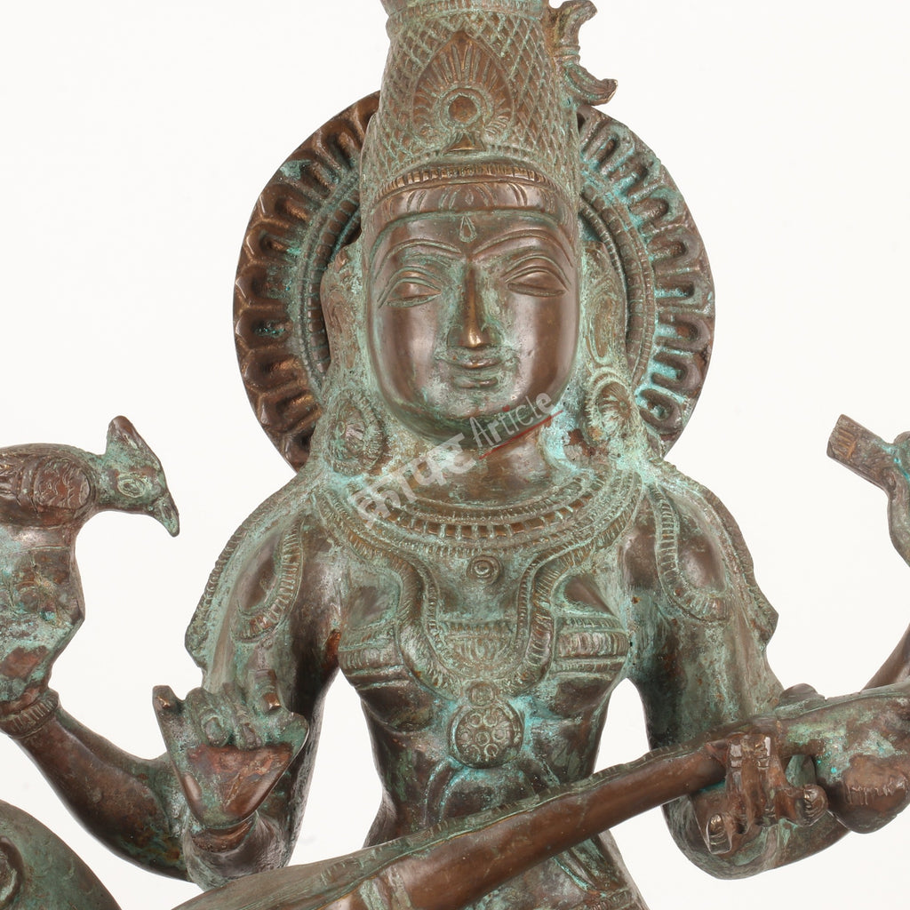 Brass Goddess Sarasvati Sculpture – Seated on Peacock