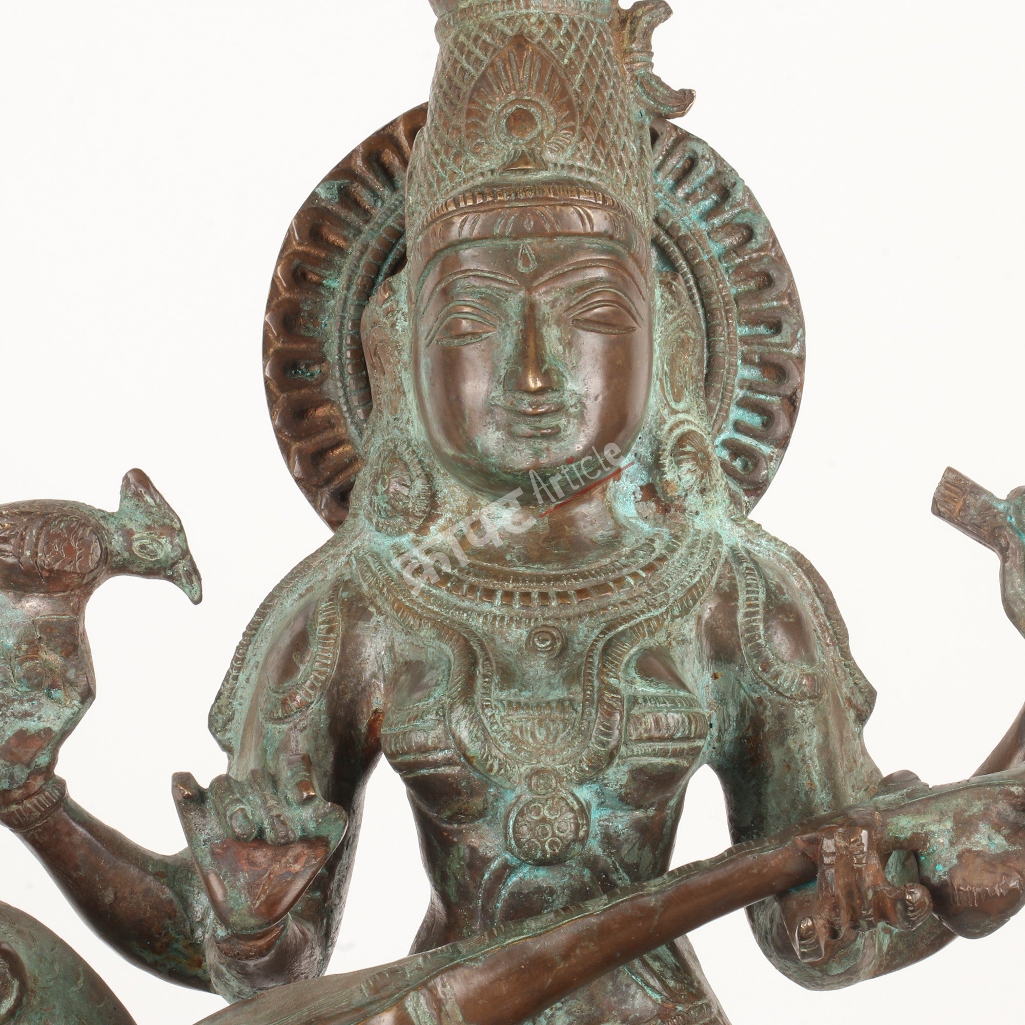 Brass Goddess Sarasvati Sculpture – Seated on Peacock