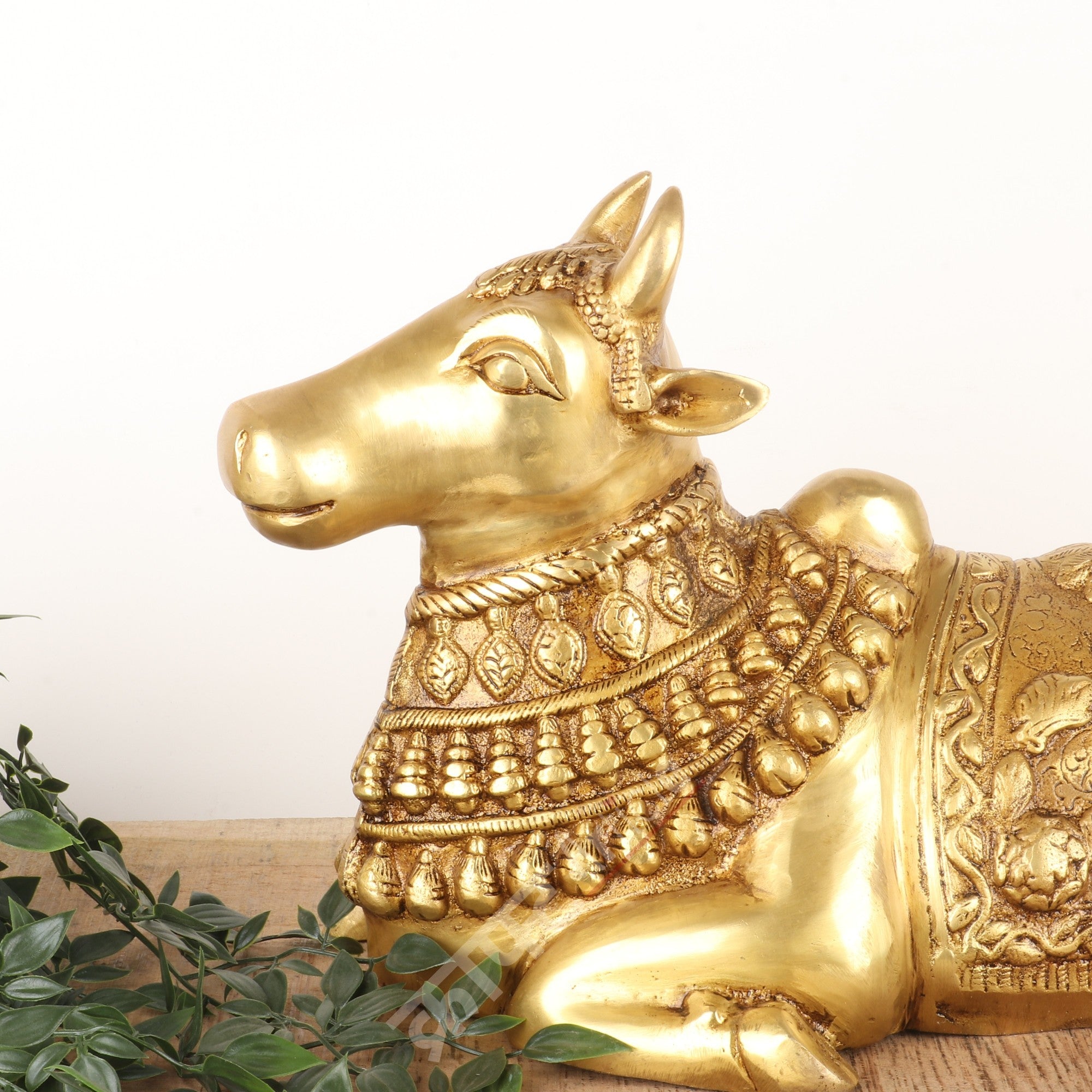 Brass Sitting Nandi Bull Idol in Gold Finish